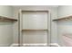 Spacious walk-in closet with built-in shelving, offering ample storage space at 5755 W Harrison St, Chandler, AZ 85226