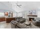 Spacious living room showcasing a fireplace, comfortable seating, and an open-concept design at 5755 W Harrison St, Chandler, AZ 85226