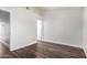 Bright bedroom features hard wood floors, neutral paint, and a large walk-in closet at 5808 E Brown Rd # 42, Mesa, AZ 85205