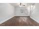 Bright, open-concept living area featuring wood-look floors and plenty of natural light at 5808 E Brown Rd # 42, Mesa, AZ 85205