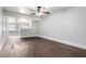 Bright, open-concept living area featuring wood-look floors and plenty of natural light at 5808 E Brown Rd # 42, Mesa, AZ 85205
