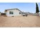 Spacious backyard features potential for landscaping, creating a serene outdoor retreat at 6225 W Mary Jane Ln, Glendale, AZ 85306