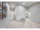 Bright foyer featuring tile flooring and modern decor at 6225 W Mary Jane Ln, Glendale, AZ 85306