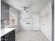 Charming eat-in kitchen featuring gray cabinetry and natural light at 6225 W Mary Jane Ln, Glendale, AZ 85306