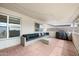 Relaxing covered patio with cozy seating, stylish furniture and outdoor grill for entertaining at 6225 W Mary Jane Ln, Glendale, AZ 85306