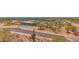 Expansive aerial view of desert home, showcasing its surroundings and ample space at 7261 E Via Dona Rd, Scottsdale, AZ 85266