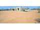 Exterior view of the modern house featuring desert landscaping at 7261 E Via Dona Rd, Scottsdale, AZ 85266