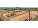 Expansive desert property featuring a modern home design with a walled yard for privacy and stunning mountain views at 7261 E Via Dona Rd, Scottsdale, AZ 85266