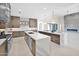 Gourmet kitchen with double islands, state-of-the-art appliances, and custom cabinetry at 7261 E Via Dona Rd, Scottsdale, AZ 85266