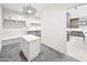 Mud room featuring an island and built-in bench with cabinets at 7261 E Via Dona Rd, Scottsdale, AZ 85266