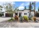 Inviting single-story home featuring low-maintenance desert landscaping and a two-car garage at 7435 E Corrine Rd, Scottsdale, AZ 85260