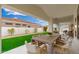 Charming outdoor dining area on a covered patio, perfect for entertaining guests at 7717 E Black Rock Rd, Scottsdale, AZ 85255