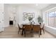 Elegant dining room with contemporary decor and plenty of natural light at 7717 E Black Rock Rd, Scottsdale, AZ 85255