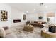 Cozy living room features a fireplace, recessed lighting, and a stylish area rug at 7717 E Black Rock Rd, Scottsdale, AZ 85255