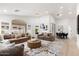 Bright living room boasts recessed lighting, neutral tones, and an open floor plan at 7717 E Black Rock Rd, Scottsdale, AZ 85255