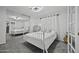 Bright bedroom featuring mirrored closet, plush carpet, white furniture, and ample natural light at 8240 E Pueblo Ave, Mesa, AZ 85208