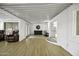 Spacious living room with hardwood floors, neutral decor, and stylish furniture arrangement at 8240 E Pueblo Ave, Mesa, AZ 85208