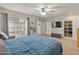 Spacious primary bedroom includes a large picture window and sliding glass door to the outdoor space at 8401 N 55Th Ave, Glendale, AZ 85302