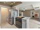 Kitchen featuring stainless steel appliances and an island with cooktop at 8401 N 55Th Ave, Glendale, AZ 85302
