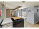 Bright kitchen features modern appliances, plenty of counter space, and a view of the backyard at 8401 N 55Th Ave, Glendale, AZ 85302