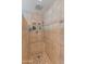 Step into this roomy tile shower with rainfall showerhead and built in shower seat at 8401 N 55Th Ave, Glendale, AZ 85302