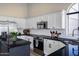 Close-up view of a kitchen with white cabinets, black countertops, and stainless steel appliances at 9032 E Larkspur Dr, Scottsdale, AZ 85260