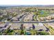 An aerial view of a home with a backyard pool and a community neighborhood at 9363 E Mendoza Ave, Mesa, AZ 85209