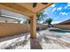 Covered backyard patio offers shade and a view of the pool at 9631 E Palm Ridge Dr, Scottsdale, AZ 85260