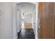 Welcoming entryway featuring stylish tile flooring and a solid wood door, leading into a bright, open-concept living space at 9631 E Palm Ridge Dr, Scottsdale, AZ 85260