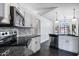 Well-appointed kitchen featuring sleek countertops, stainless steel appliances, and an open layout for easy movement at 9631 E Palm Ridge Dr, Scottsdale, AZ 85260