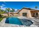 Backyard pool with patio and beautiful landscaping at 9631 E Palm Ridge Dr, Scottsdale, AZ 85260
