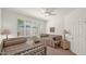 Neutral bedroom with decorative pillows, blinds, side table, and lamps at 10421 N 100Th St, Scottsdale, AZ 85258