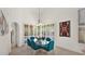 Dining area with a glass table, blue chairs, and shutters at 10421 N 100Th St, Scottsdale, AZ 85258