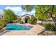 Stunning pool and spa with lush landscaping and an open patio, ideal for outdoor entertaining at 10421 N 100Th St, Scottsdale, AZ 85258