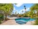 A luxurious pool and spa combination with waterfront views at 10421 N 100Th St, Scottsdale, AZ 85258