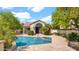 Beautiful pool and spa with lush landscaping and an open patio, great for outdoor relaxation and fun at 10421 N 100Th St, Scottsdale, AZ 85258