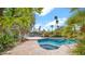 Beautiful swimming pool with palm trees offering water views at 10421 N 100Th St, Scottsdale, AZ 85258