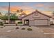 Charming single-story home showcasing a tile roof, desert landscaping, and an inviting front entrance at 10563 E Bella Vista Dr, Scottsdale, AZ 85258