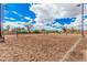 Several sand volleyball courts are set up and ready for play under a blue sky at 10563 E Bella Vista Dr, Scottsdale, AZ 85258