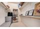 Walk-in closet features white shelving, hanging rods, and organizers with baskets for ample storage at 10563 E Bella Vista Dr, Scottsdale, AZ 85258