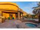 Wonderful backyard featuring a pool, spa, flagstone patios, and desert landscaping at 10707 E Cottontail Ln, Scottsdale, AZ 85255