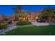 Spacious backyard with a pool, putting green, and multiple seating areas at 10707 E Cottontail Ln, Scottsdale, AZ 85255