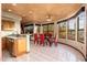 Open dining room with large windows and a view of the surrounding landscape at 10707 E Cottontail Ln, Scottsdale, AZ 85255