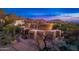 Beautiful desert home with a three car garage, desert landscaping and gorgeous views of the surrounding mountains at 10707 E Cottontail Ln, Scottsdale, AZ 85255