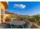 Open air patio offering a scenic view of the desert landscape and mountain range at 10707 E Cottontail Ln, Scottsdale, AZ 85255