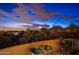 Balcony view of city lights and the surrounding desert landscape at 10707 E Cottontail Ln, Scottsdale, AZ 85255