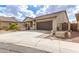 Charming single-story home with a tile roof and a two car garage at 11831 W Daley Ct, Sun City, AZ 85373