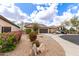 Charming single-story home with a desert landscaped front yard and two car garage at 11831 W Daley Ct, Sun City, AZ 85373