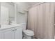 Bathroom featuring a shower curtain and a single sink vanity with white cabinets at 1201 S 80Th St, Mesa, AZ 85209