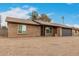 Charming single-story brick home featuring a two-car garage and a low-maintenance desert landscape at 1201 S 80Th St, Mesa, AZ 85209